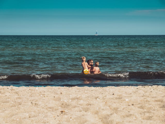 A man and a woman in the water.
